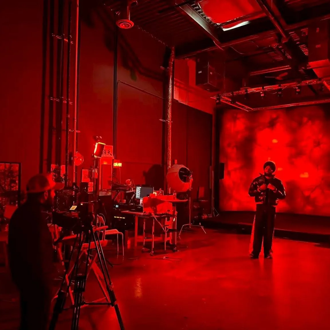 Music video shoot on a red LED set at Upperland Studio